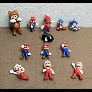 Lot of 12 Jakks Super Mario Figures: Ice, Tanooki, Propeller, Fire, Mario & More